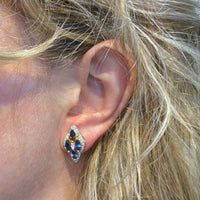 Sapphire and diamond marquise stud earrings in 18 carat gold