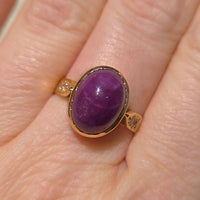 Cabochon ruby and diamond ring in 18 carat gold