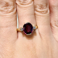 Vintage garnet and diamond ring in 14 carat gold