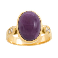 Cabochon ruby and diamond ring in 18 carat gold