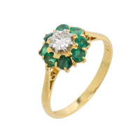 Emerald and diamond ring in platinum and gold