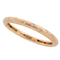 14 carat gold band with diamonds