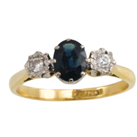 Vintage three stone sapphire and diamond ring