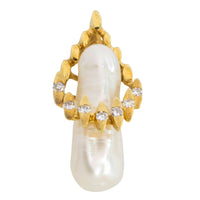 Baroque pearl and diamond pendant in 14 carat gold