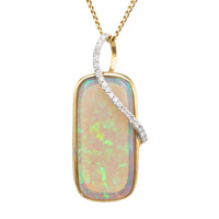 Opal and diamond pendant in 18 carat gold