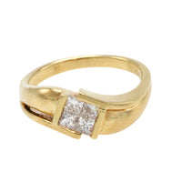 18 carat gold ring with princess cut diamonds