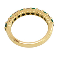 Emerald and diamond band in 18 carat gold