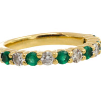Emerald and diamond band in 18 carat gold