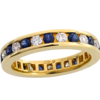 Sapphire and diamond eternity band in 18 carat gold