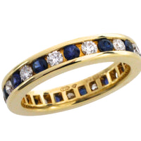 Sapphire and diamond eternity band in 18 carat gold