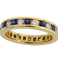 Sapphire and diamond eternity band in 18 carat gold
