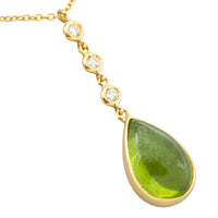 Peridot and diamnd pendant in 18 carat gold