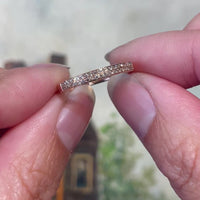 Rose gold half eternity band with diamonds