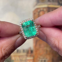 Emerald and diamond ring in 18 carat gold