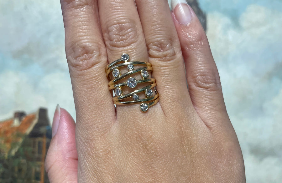 Wrap around ring bezel set with diamonds