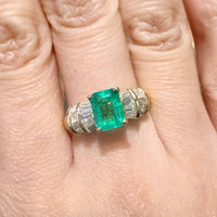 Emerald and baguette cut diamond ring in 18 carat gold