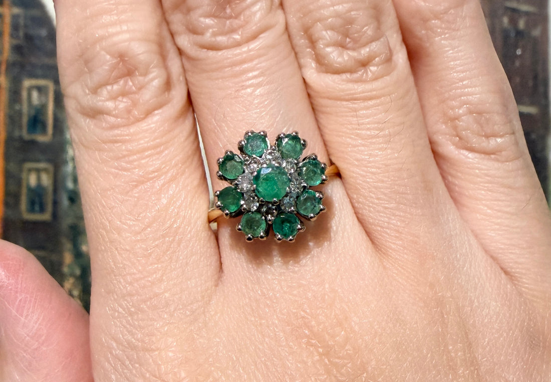 Vintage emerald and diamond cluster ring