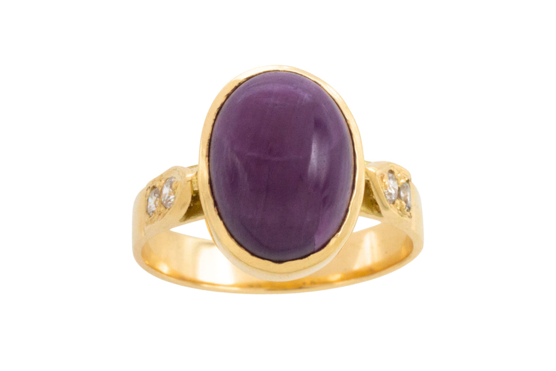 Cabochon ruby and diamond ring in 18 carat gold