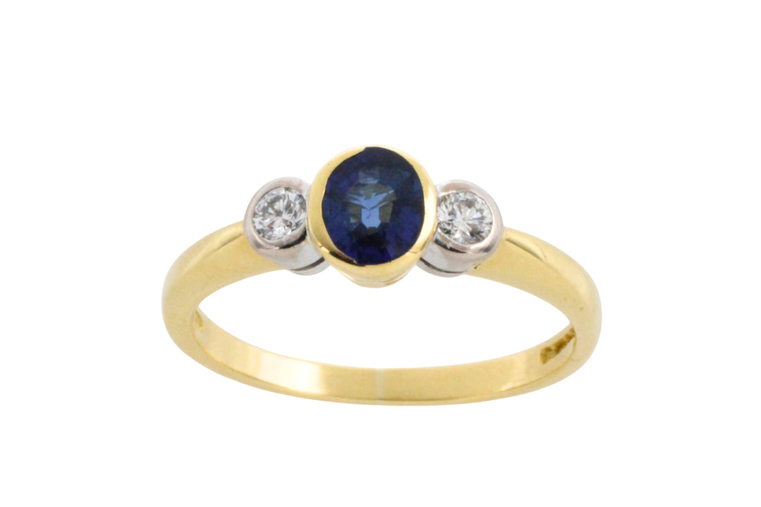 Sapphire and diamond three stone ring