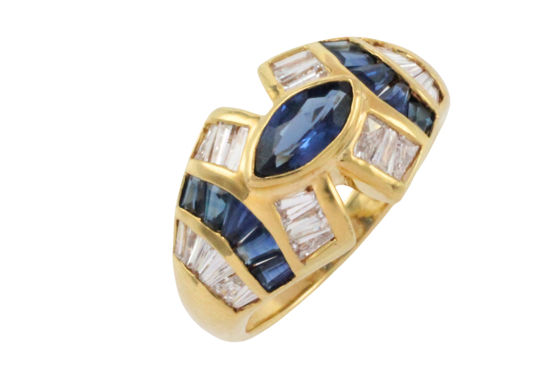 Sapphire and baguette cut diamond ring