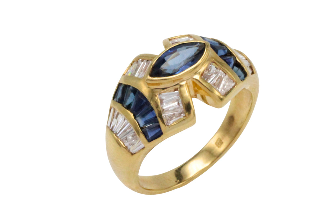 Sapphire and baguette cut diamond ring