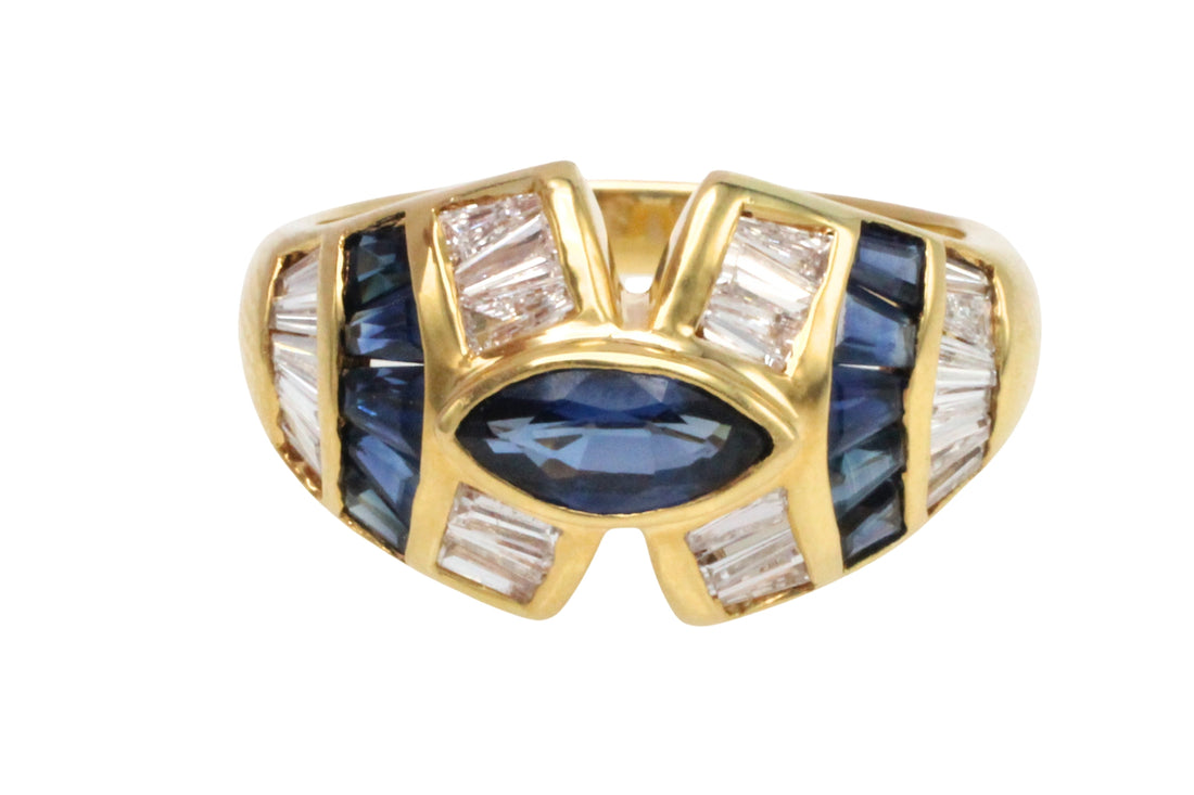 Sapphire and baguette cut diamond ring