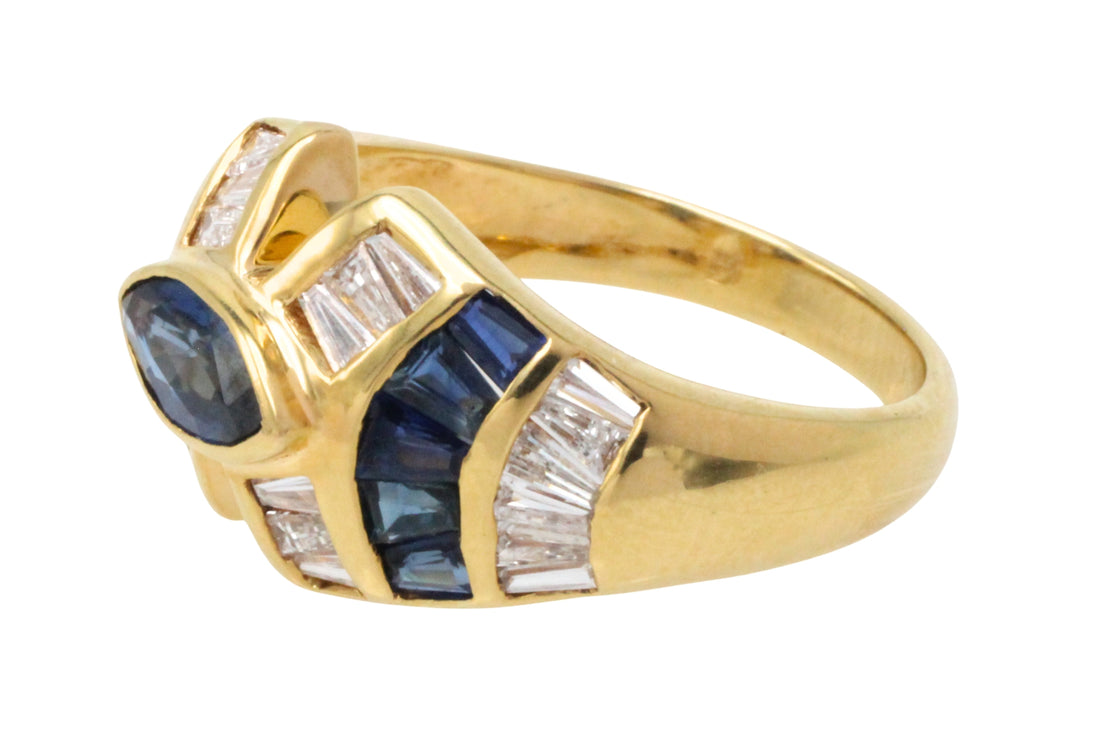 Sapphire and baguette cut diamond ring