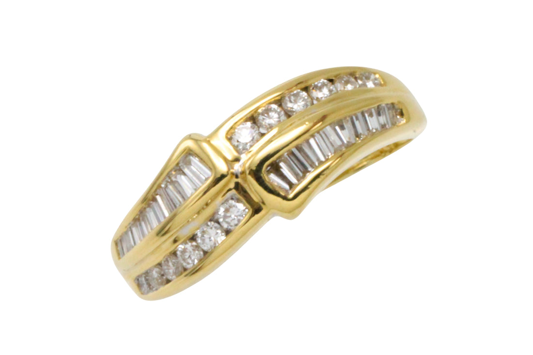 Baguette and brilliant cut diamond ring in 18 carat gold