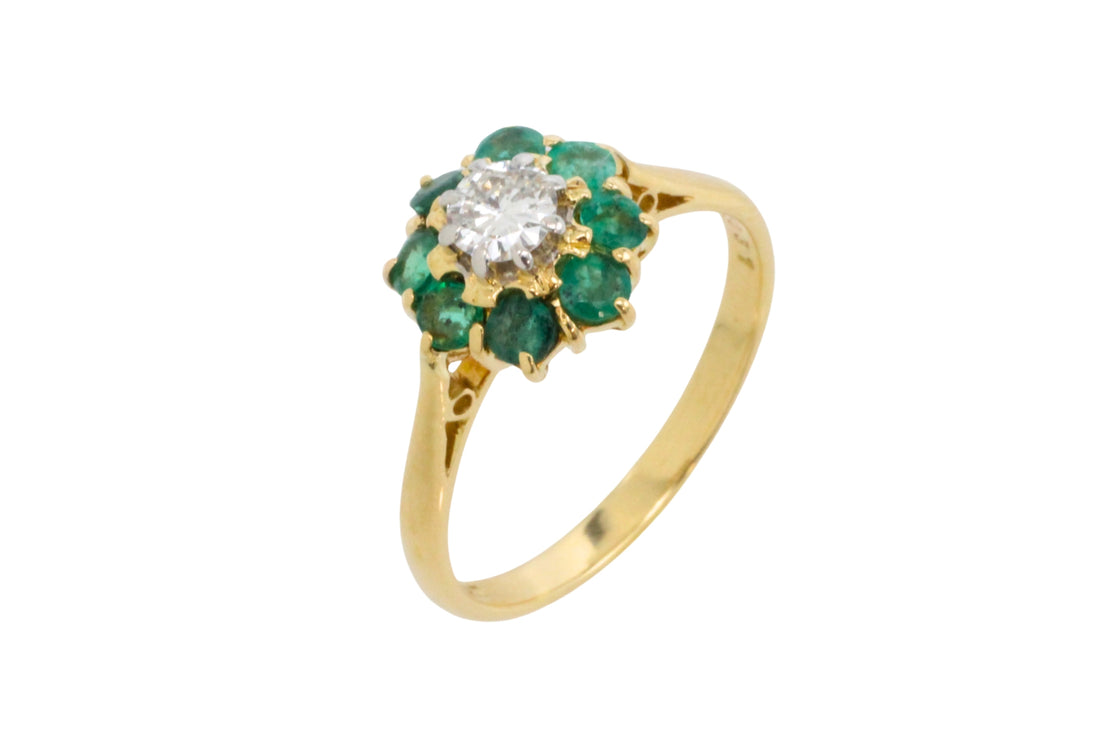 Emerald and diamond ring in platinum and gold