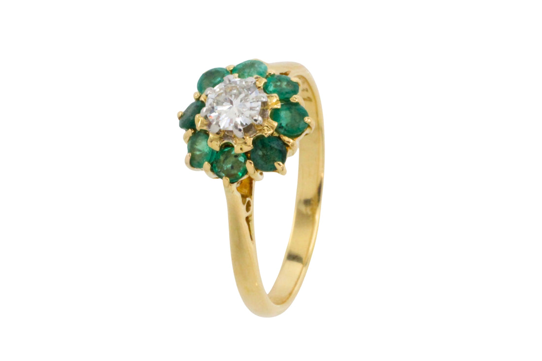 Emerald and diamond ring in platinum and gold