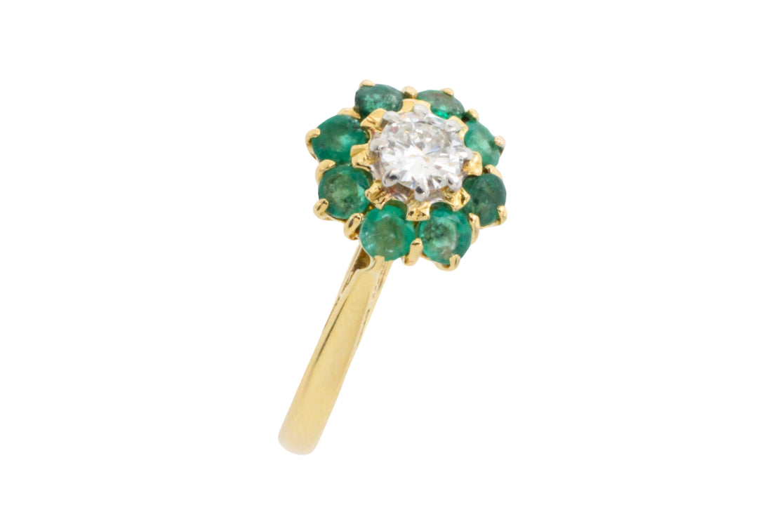 Emerald and diamond ring in platinum and gold