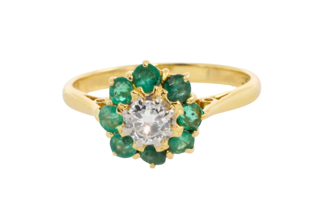 Emerald and diamond ring in platinum and gold