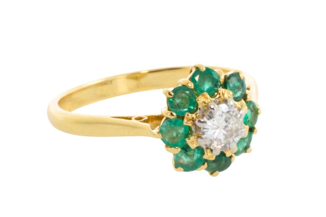 Emerald and diamond ring in platinum and gold