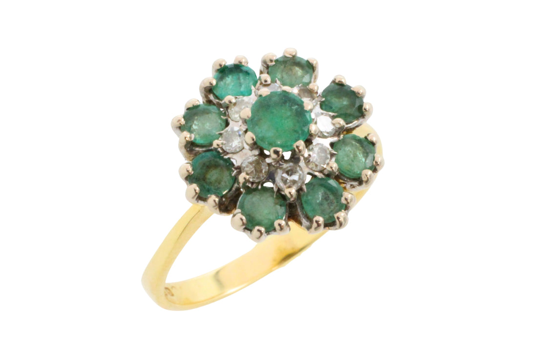 Vintage emerald and diamond cluster ring