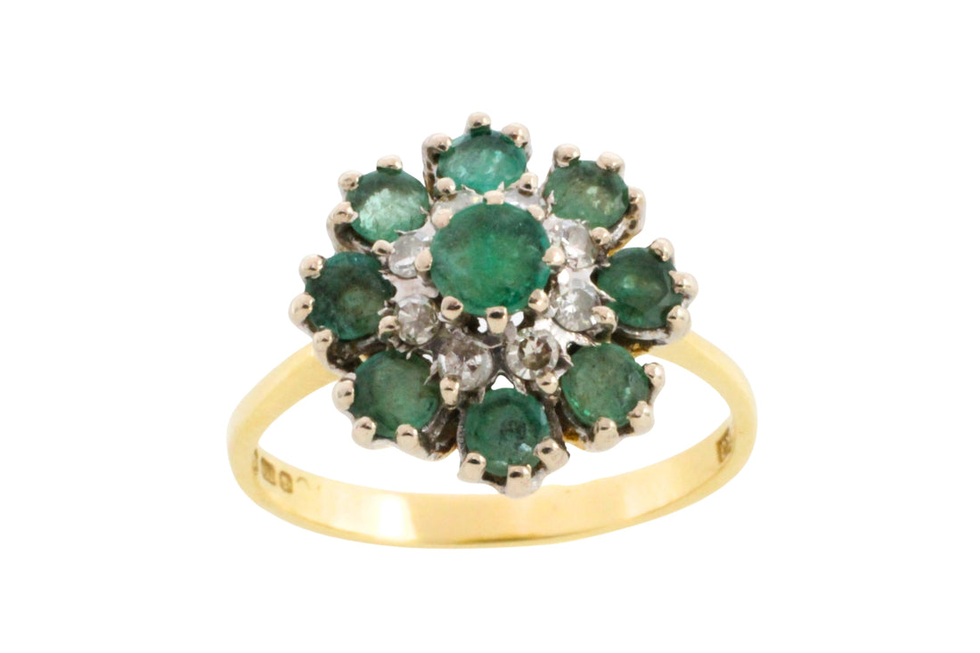Vintage emerald and diamond cluster ring