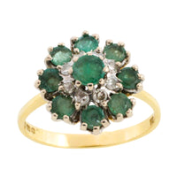 Vintage emerald and diamond cluster ring