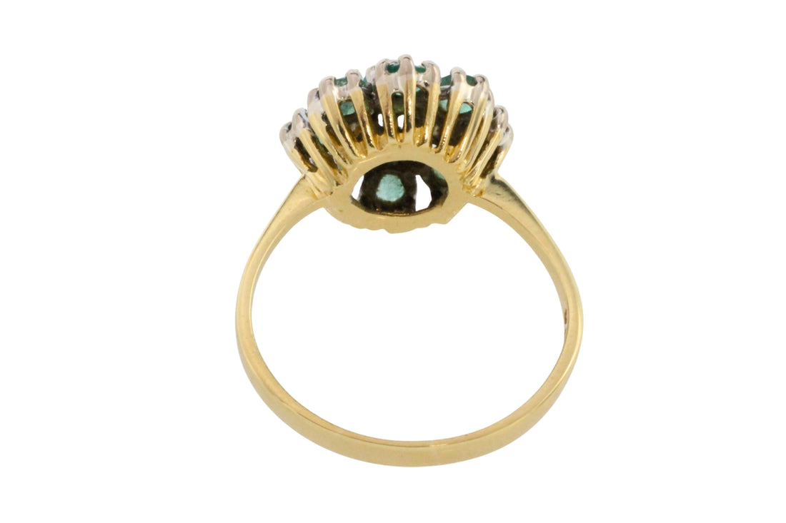 Vintage emerald and diamond cluster ring