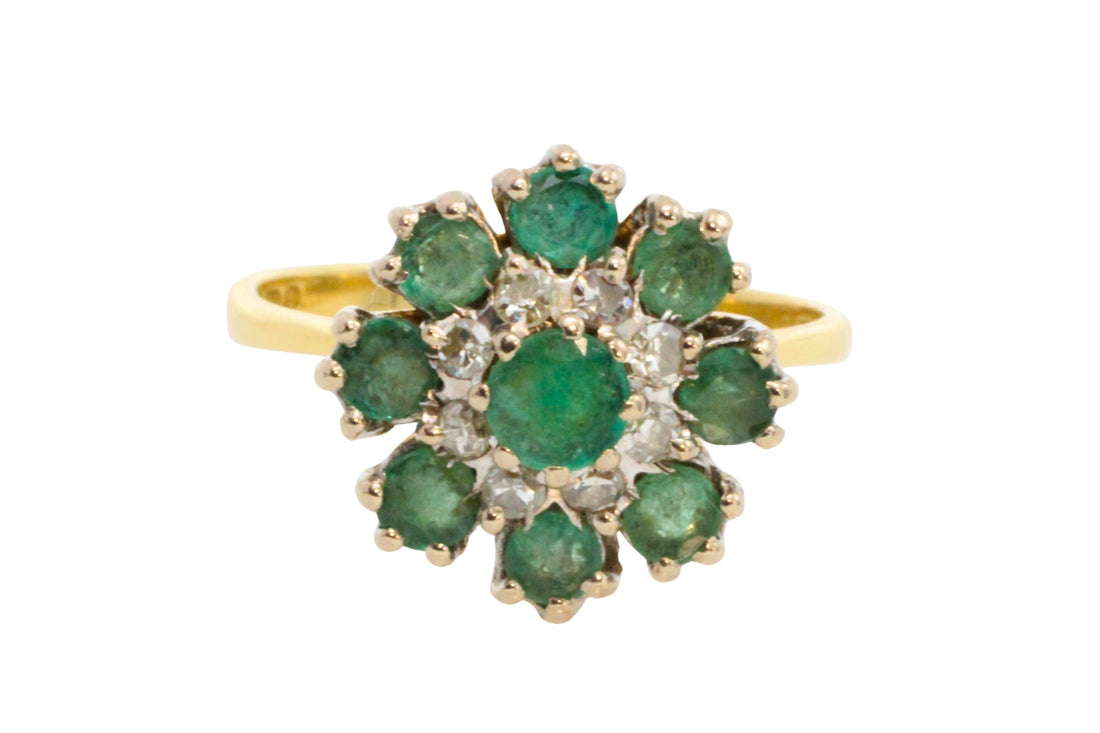 Vintage emerald and diamond cluster ring