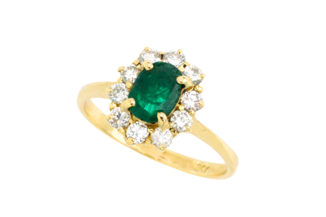 Vintage smaragd en diamanten ring van 18 karaat goud