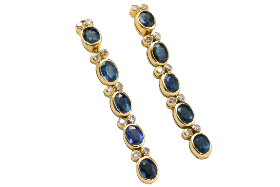 Sappire pendant earrings in 18 carat gold