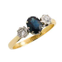 Vintage three stone sapphire and diamond ring