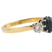 Vintage three stone sapphire and diamond ring