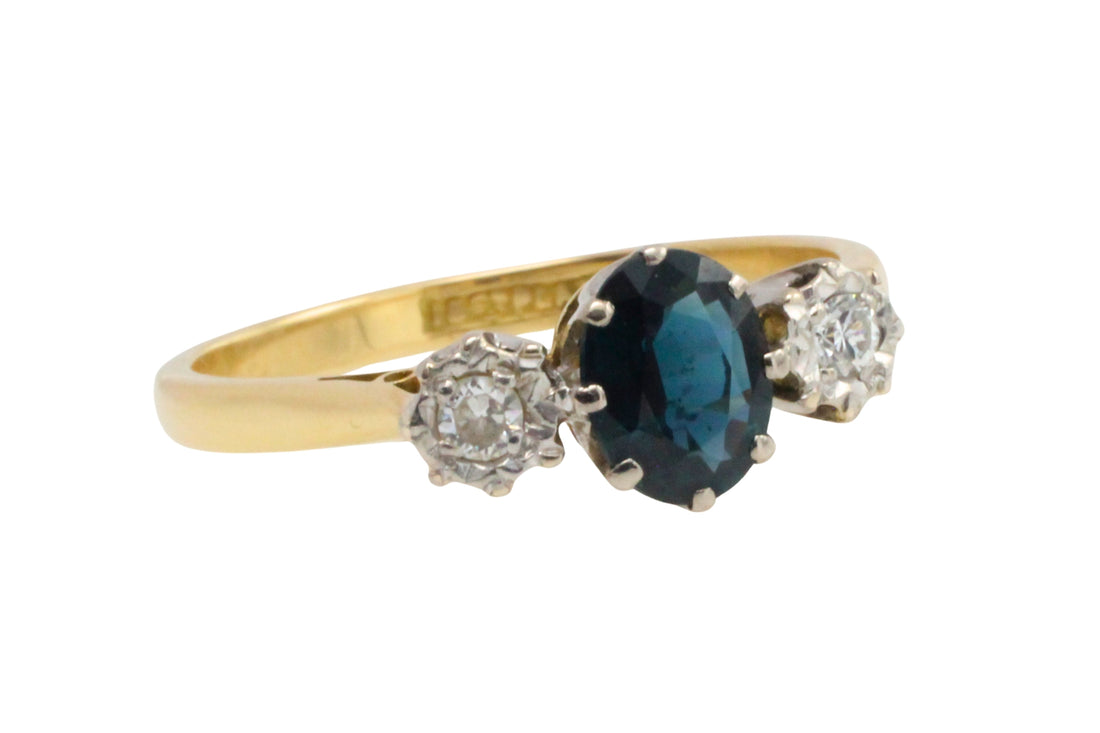 Vintage three stone sapphire and diamond ring