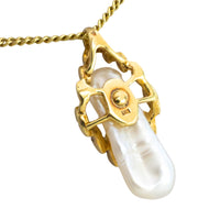 Baroque pearl and diamond pendant in 14 carat gold