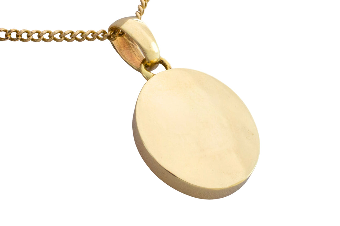 Orange opal pendant in 14 carat gold
