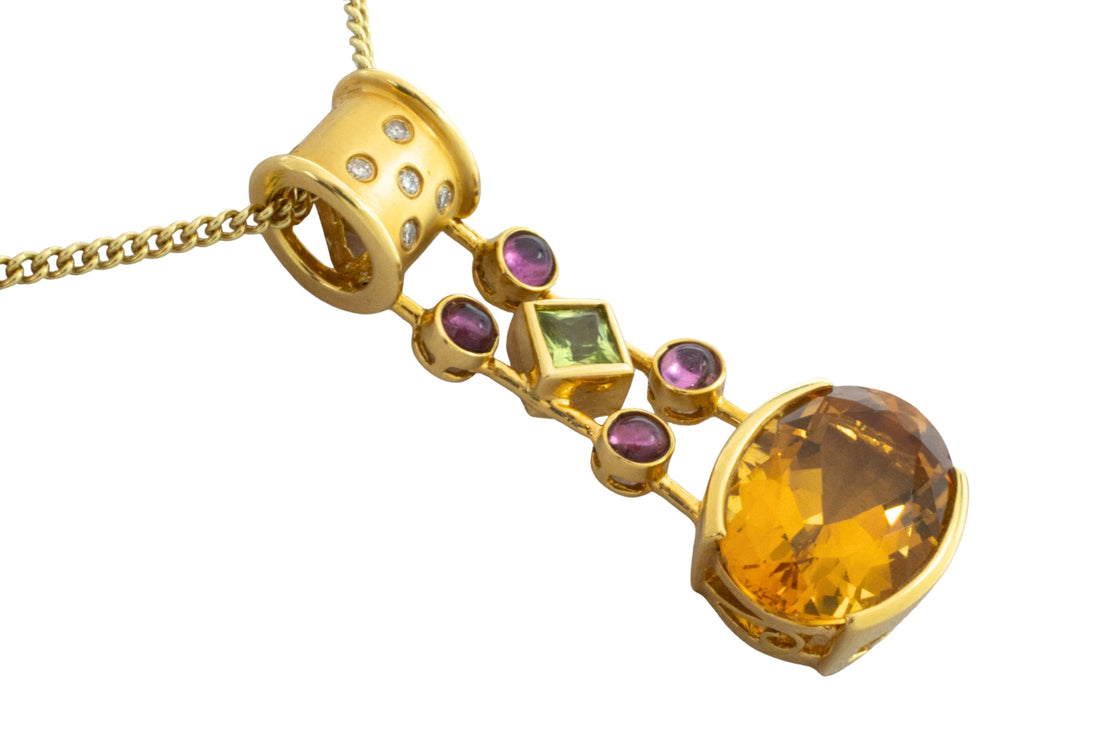 Gold pendant with citrine amethyst peridot and diamonds