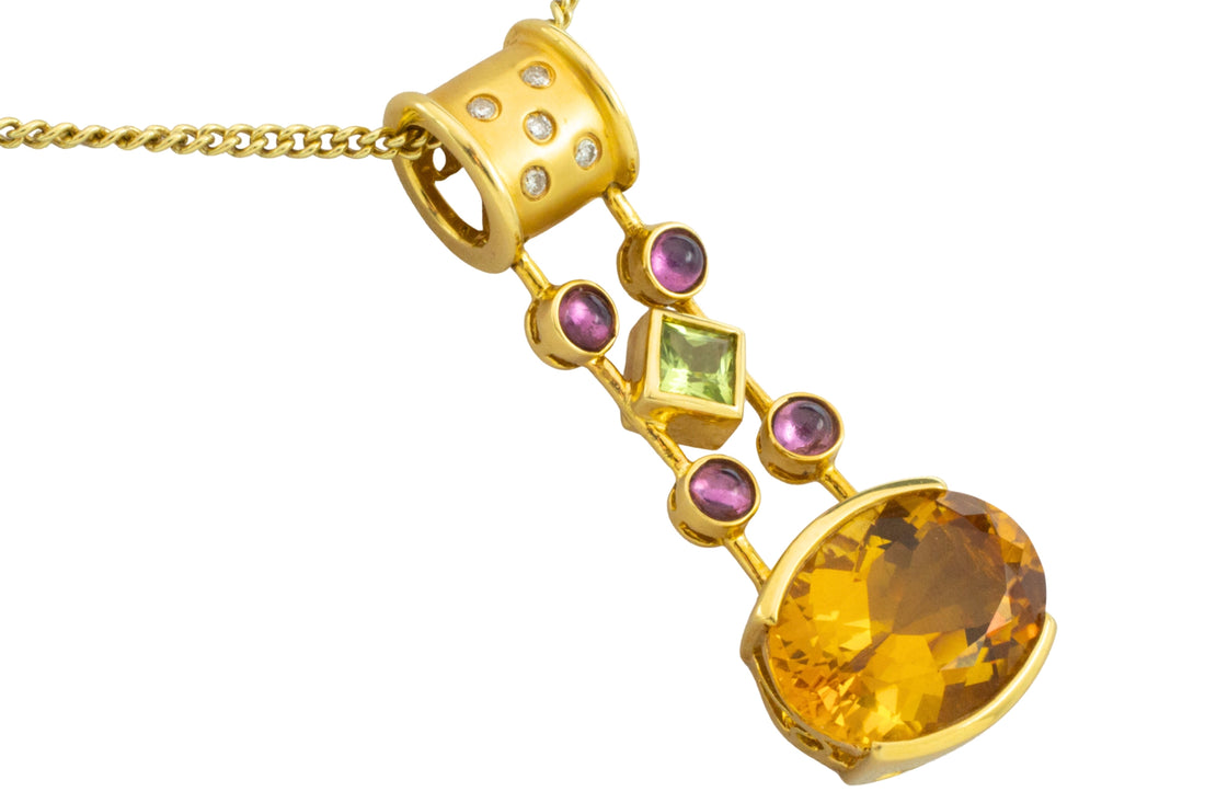 Gold pendant with citrine amethyst peridot and diamonds