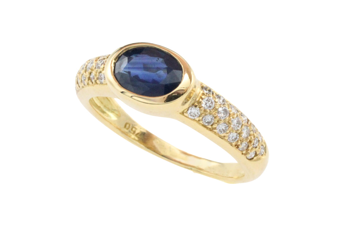 Sapphire and diamond ring in 18 carat gold