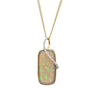 Opal and diamond pendant in 18 carat gold
