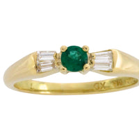 Emerald and baguette diamond ring in 18 carat gold
